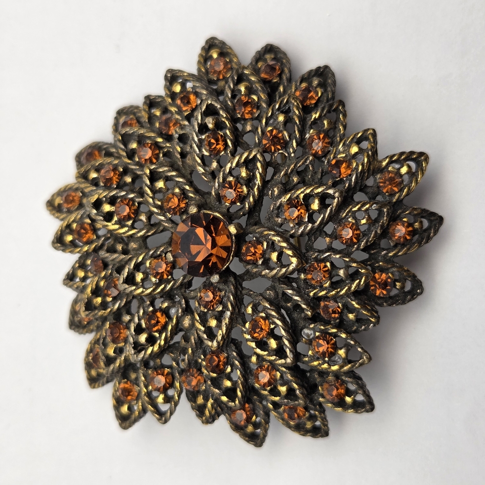 Elegant Gold and Orange Brooch